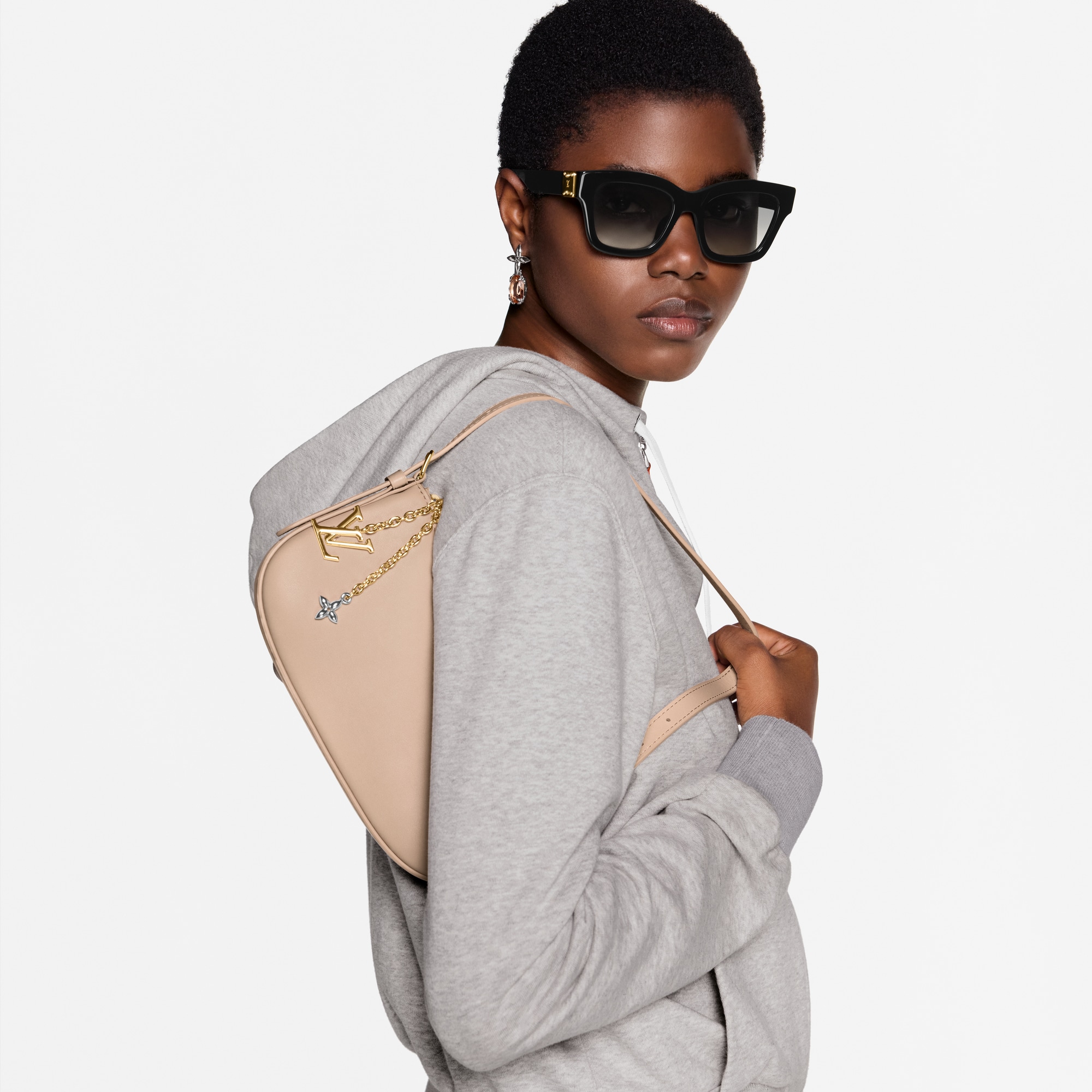 Pochette LV Bloom H36 in Wanita